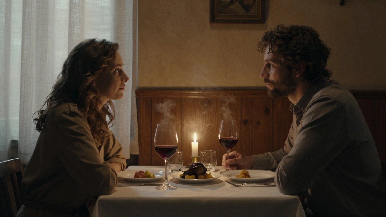 Two people enjoy an intimate dinner in a warm, candlelit restaurant in Lille.